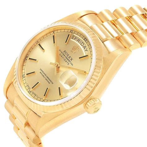 18 carat gold rolex watch.